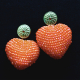 Leuchtende Herz-Ohrringe in Orange: Ein Verspieltes Accessoire mit Eleganter Note