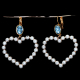 Herzensglanz – Romantische Ohrringe mit Swarovski-Perlen und funkelndem Blau